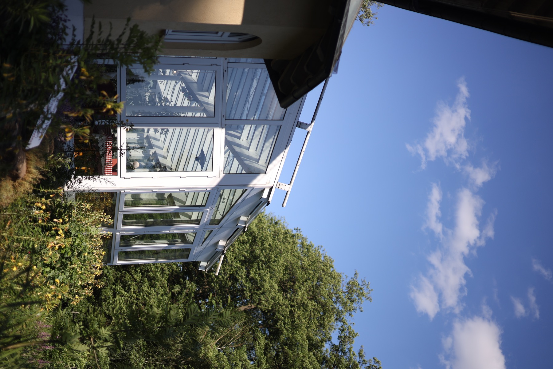 The Gondelfahrt conservatory exterior surrounded by greenery